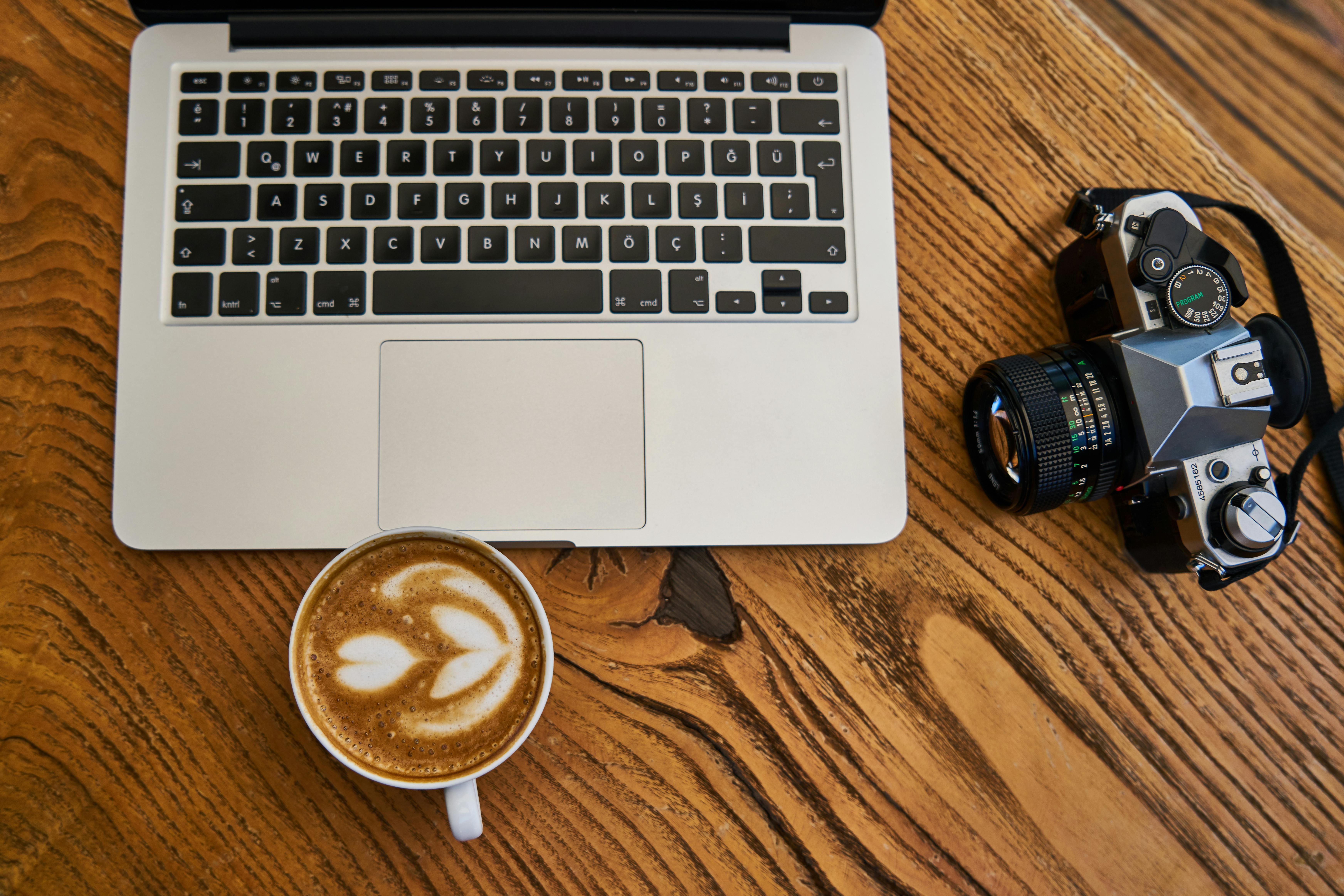 Top View Photo of Laptop Near Camera