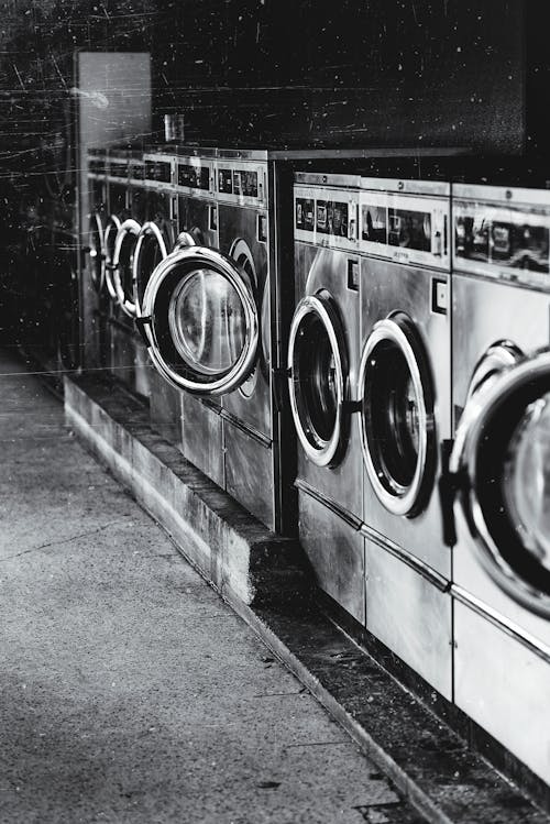 Grayscale Photography of Front-load Washers