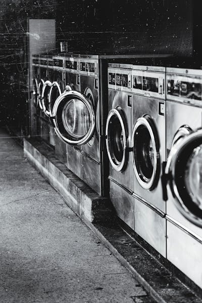 old washing machines arranged in a row