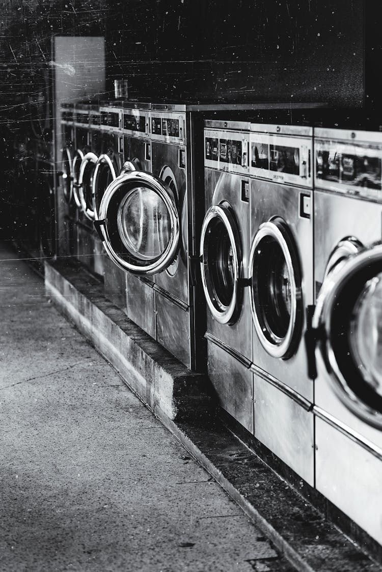 Grayscale Photography Of Front-load Washers