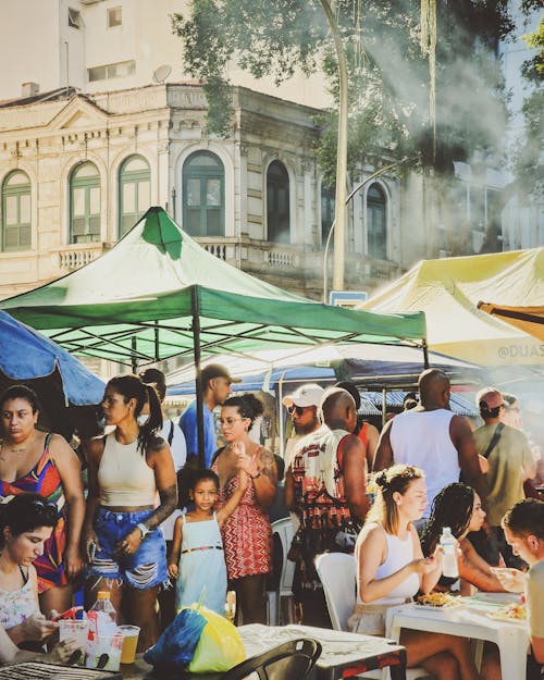 People are gathered at an outdoor market