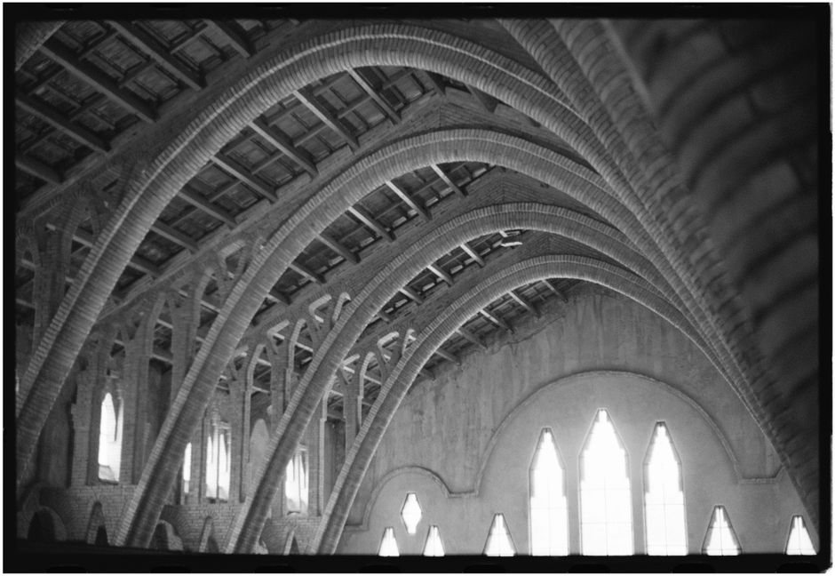 Elegant black and white photo of winery arches in Spain capturing architectural beauty.