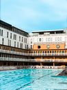 A building next to a swimming pool