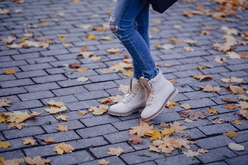 Person Wearing White Work Boots