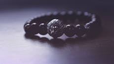Black Beaded Lion Pendant Bracelet