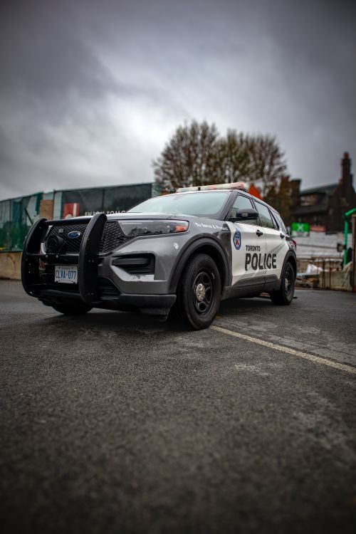 Police Water Reflection Police Car Reflection on Wet Pavement · Free Stock Photo