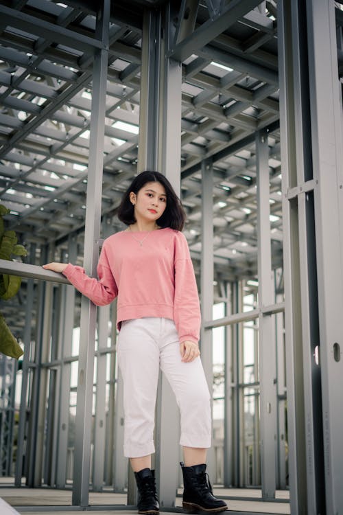 Woman Standing Beside Glass Door