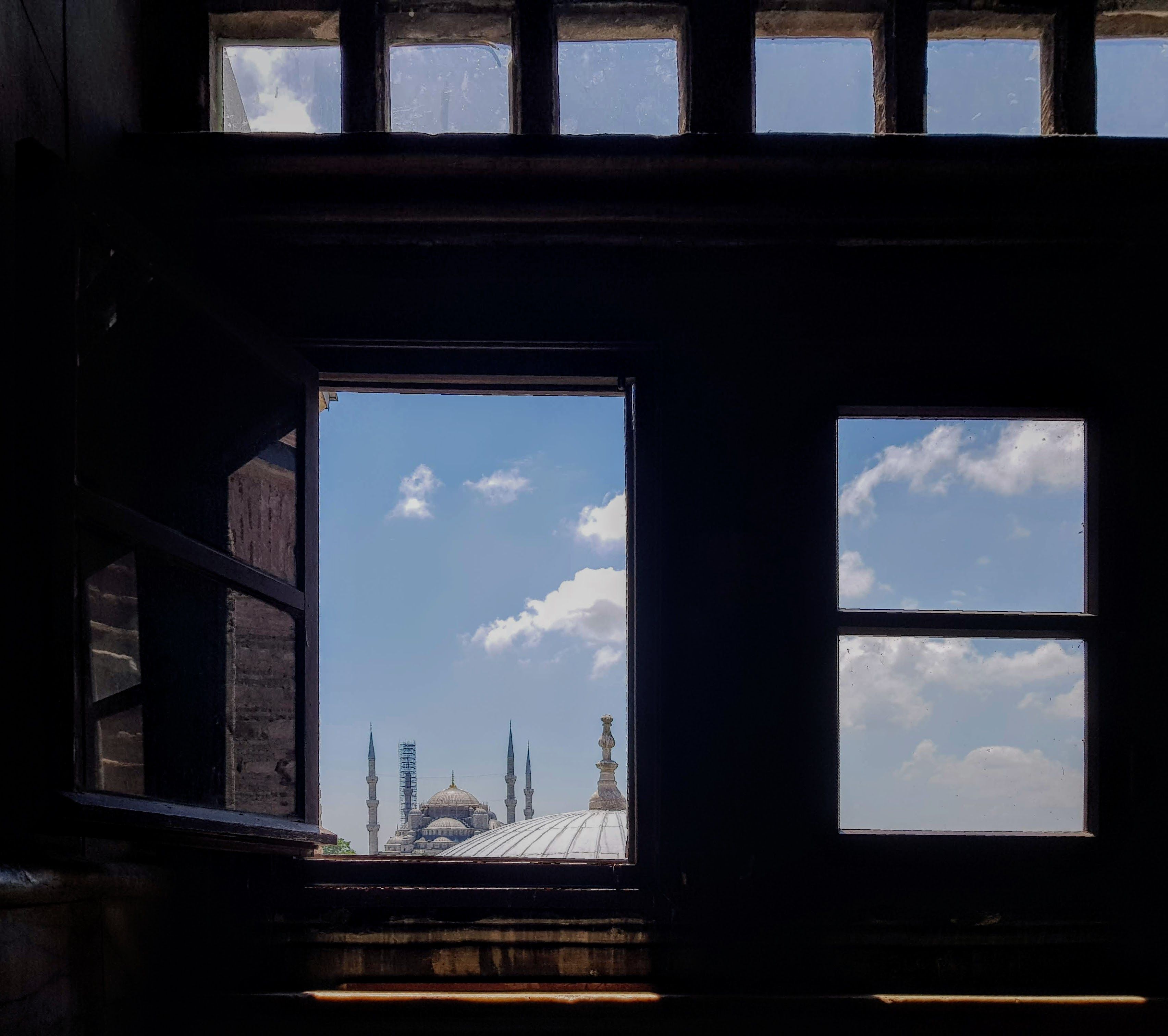 View of the Domes and Minarets of Mosques through the Window of a ...