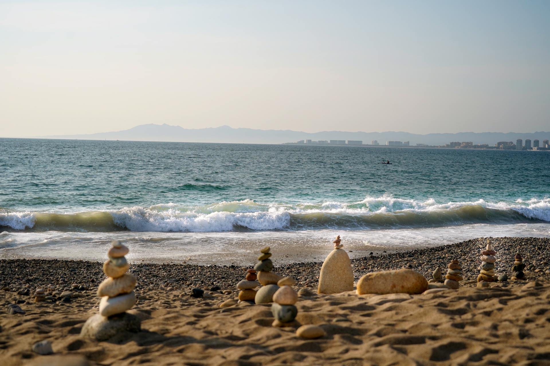 Photo of Rock Cairns on a Beach