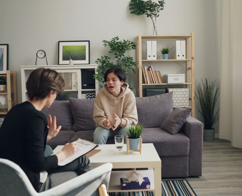 Child engaged in ABA therapy session at home with therapist
