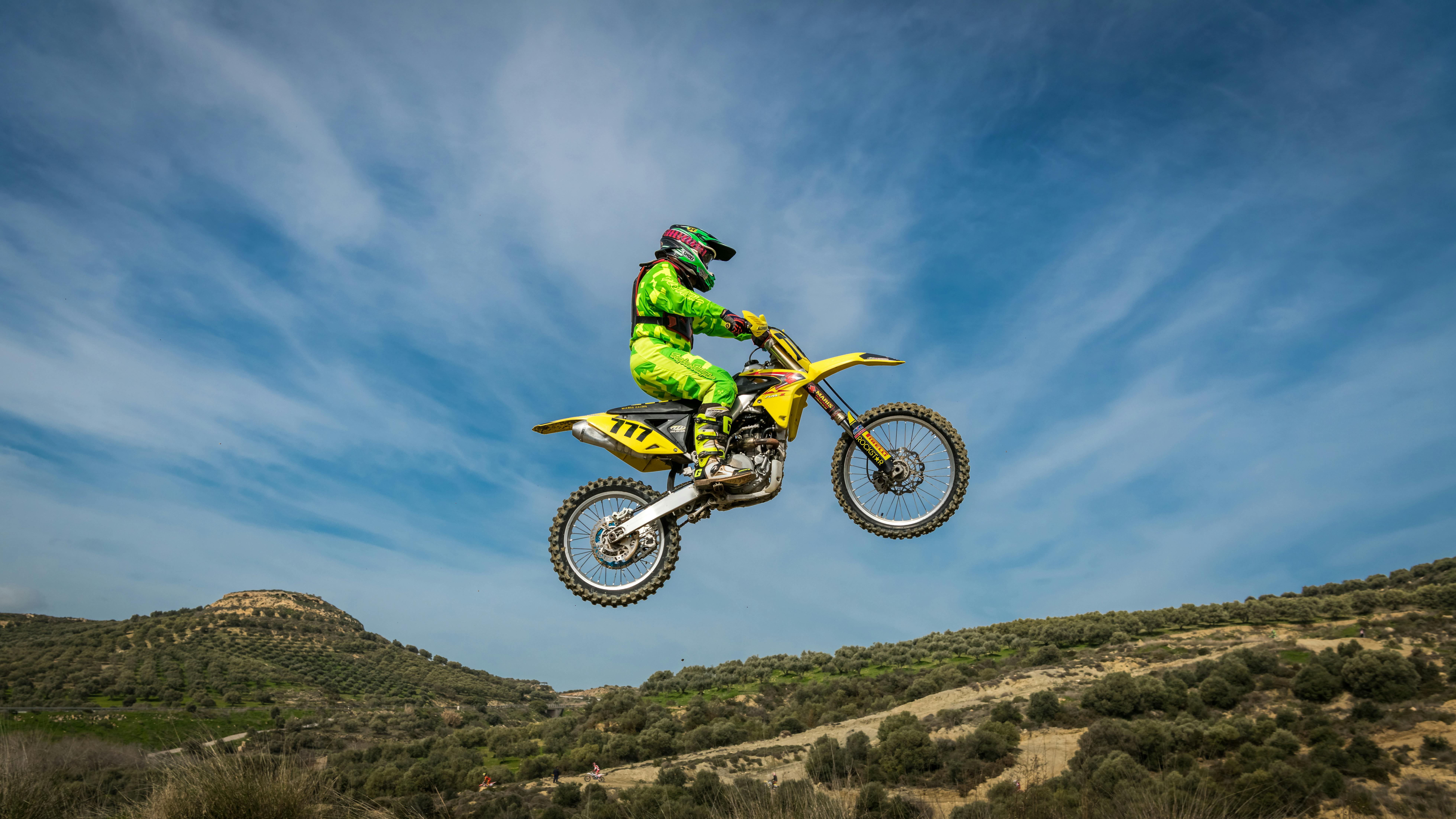 Man Riding Motocross Dirt Bike · Free Stock Photo