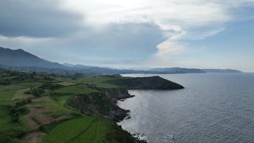 Fotos de stock gratuitas de cerca del mar, cielo nublado, horizonte