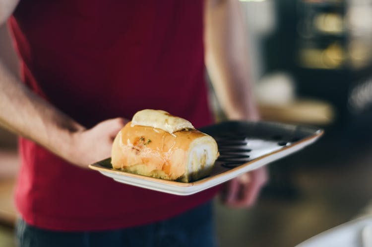 Man Serves Stuffed Bread