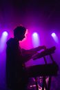 Man holding DJ mixer machine