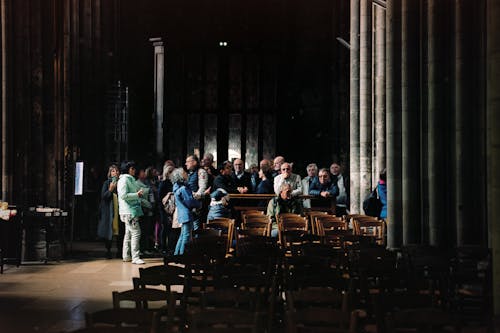 A group of people standing in a church