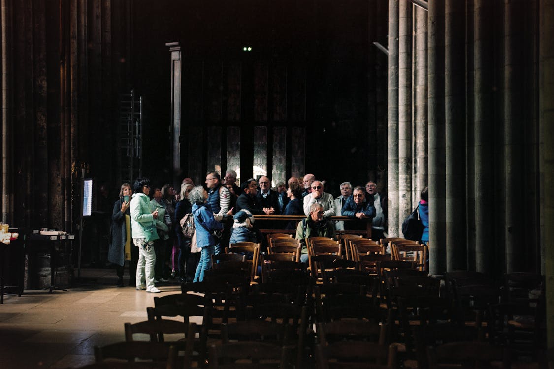 A group of people standing in a church