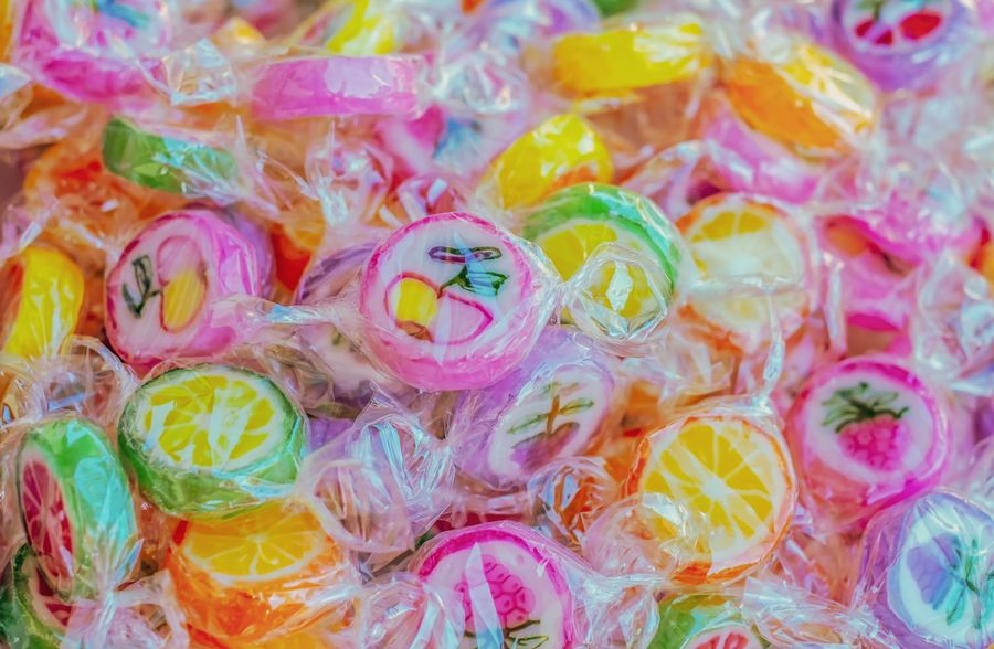 Wrapped fruit sweets in a pile