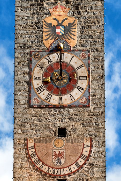 Free Close-up of the historic clock tower in Sterzing, Italy, with vivid colors and detailed architecture. Stock Photo