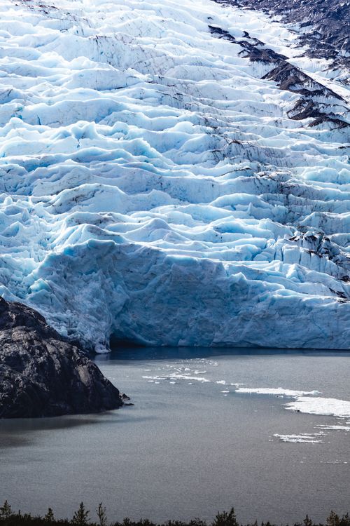 Free Majestic glacier landscape meeting the sea, showcasing natural beauty and icy textures. Stock Photo