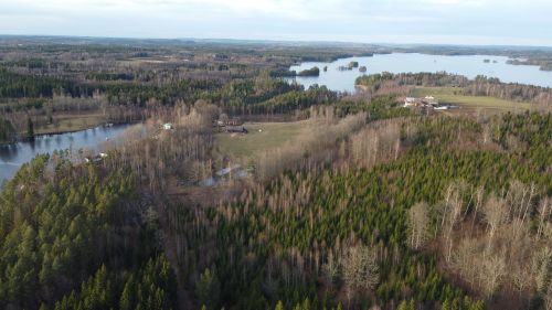 Free A breathtaking aerial perspective of Kronoberg County's serene forests and lakes. Perfect for nature enthusiasts. Stock Photo