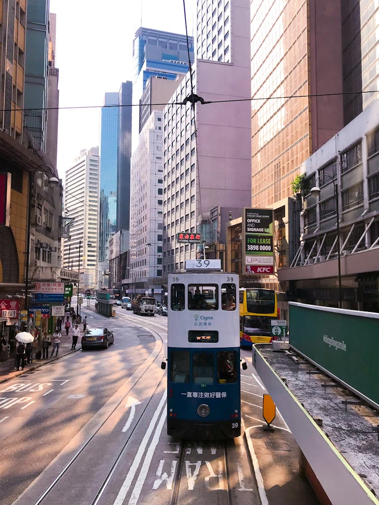 Blue And White Double Decker Train On Road