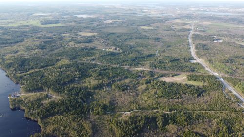 Free Stunning aerial view of lush greenery and expansive landscape in Kronobergs län, Sweden. Stock Photo