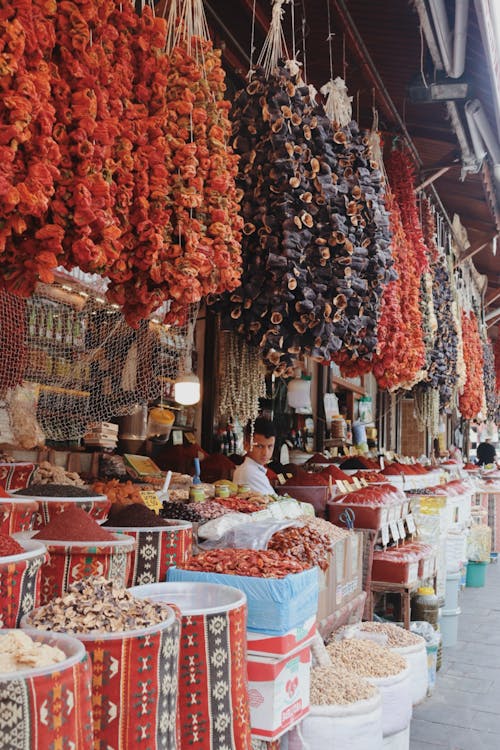 A market with dried fruits and vegetables on display