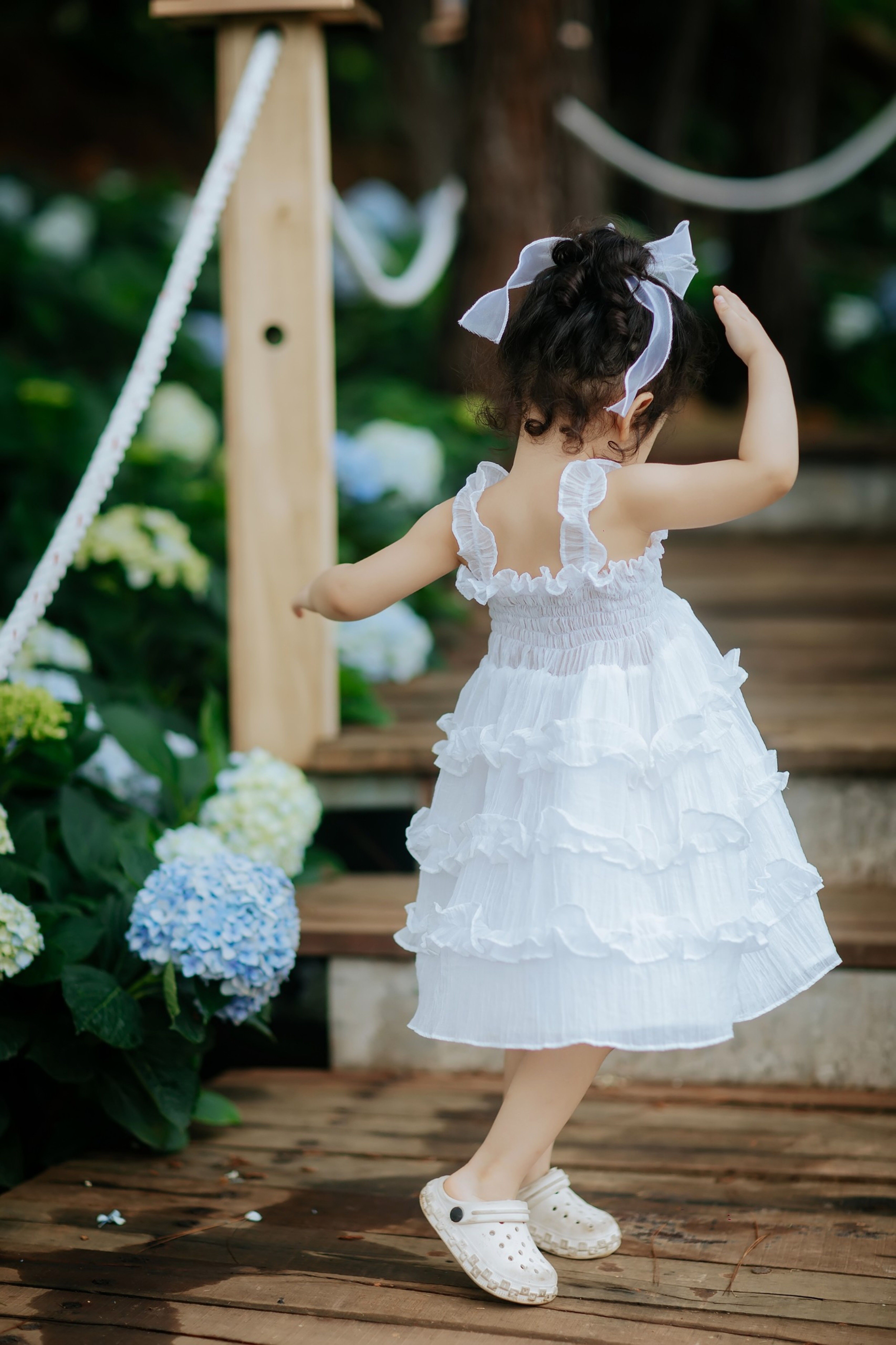 Girl Wearing White Dress on Wooden Stairs · Free Stock Photo