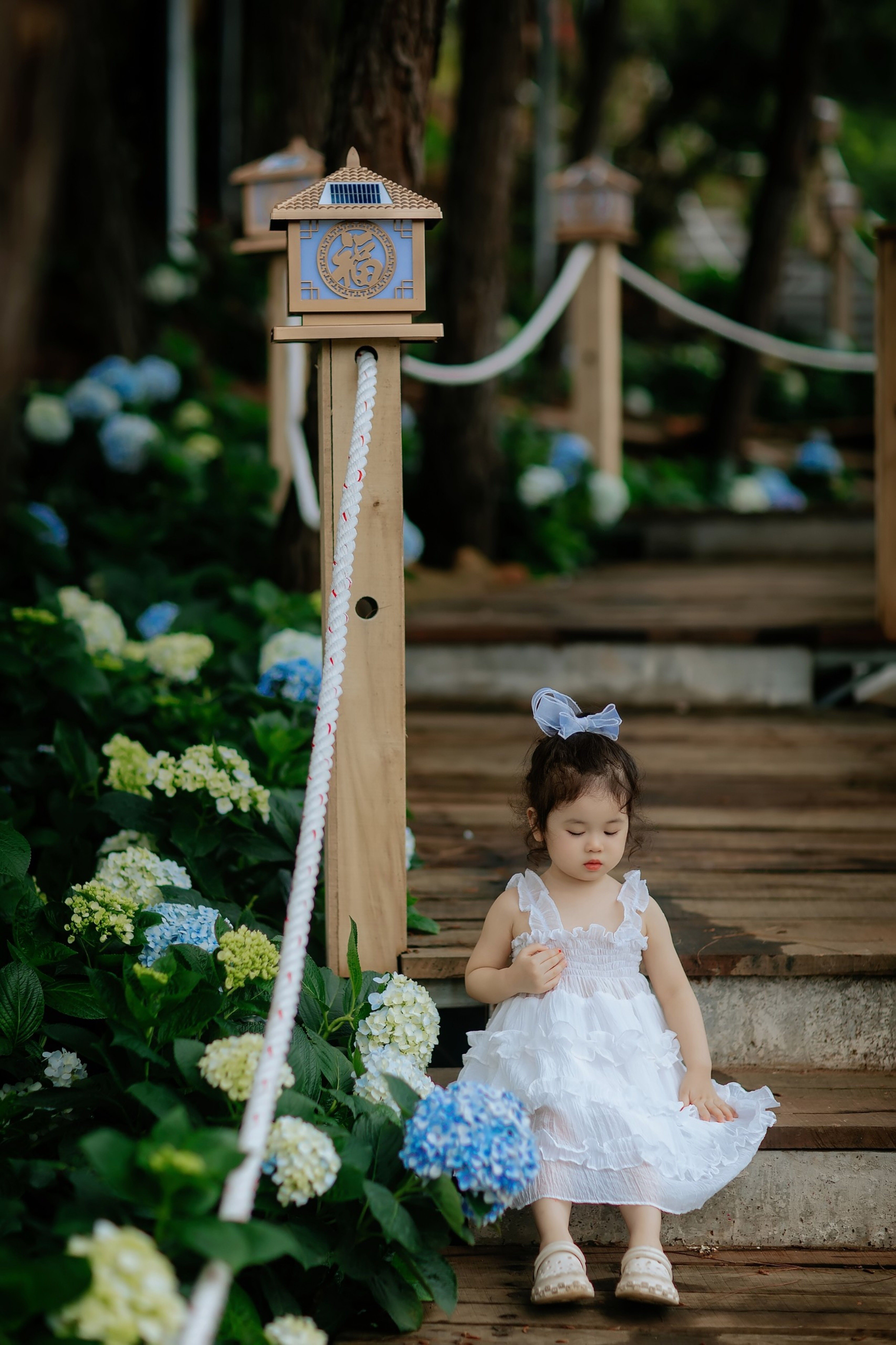 Girl Wearing White Dress on Wooden Stairs · Free Stock Photo
