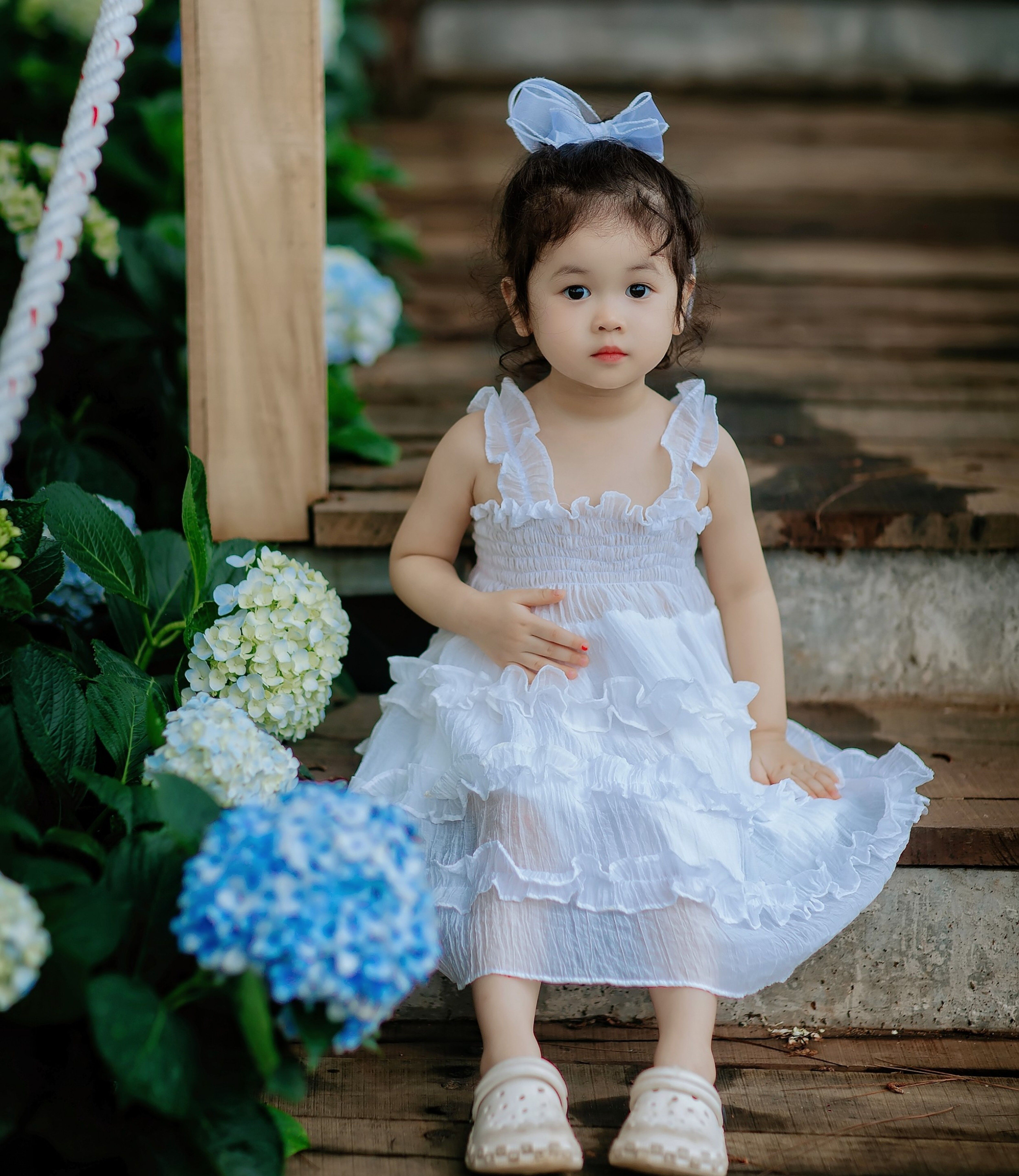 Girl Wearing White Dress on Wooden Stairs · Free Stock Photo