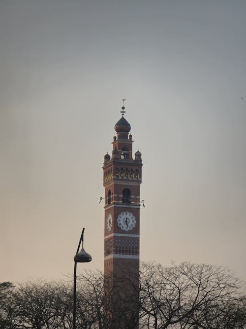 A tall clock tower with a clock on top