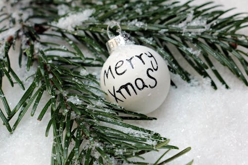 Free White Bauble on Christmas Tree Stock Photo