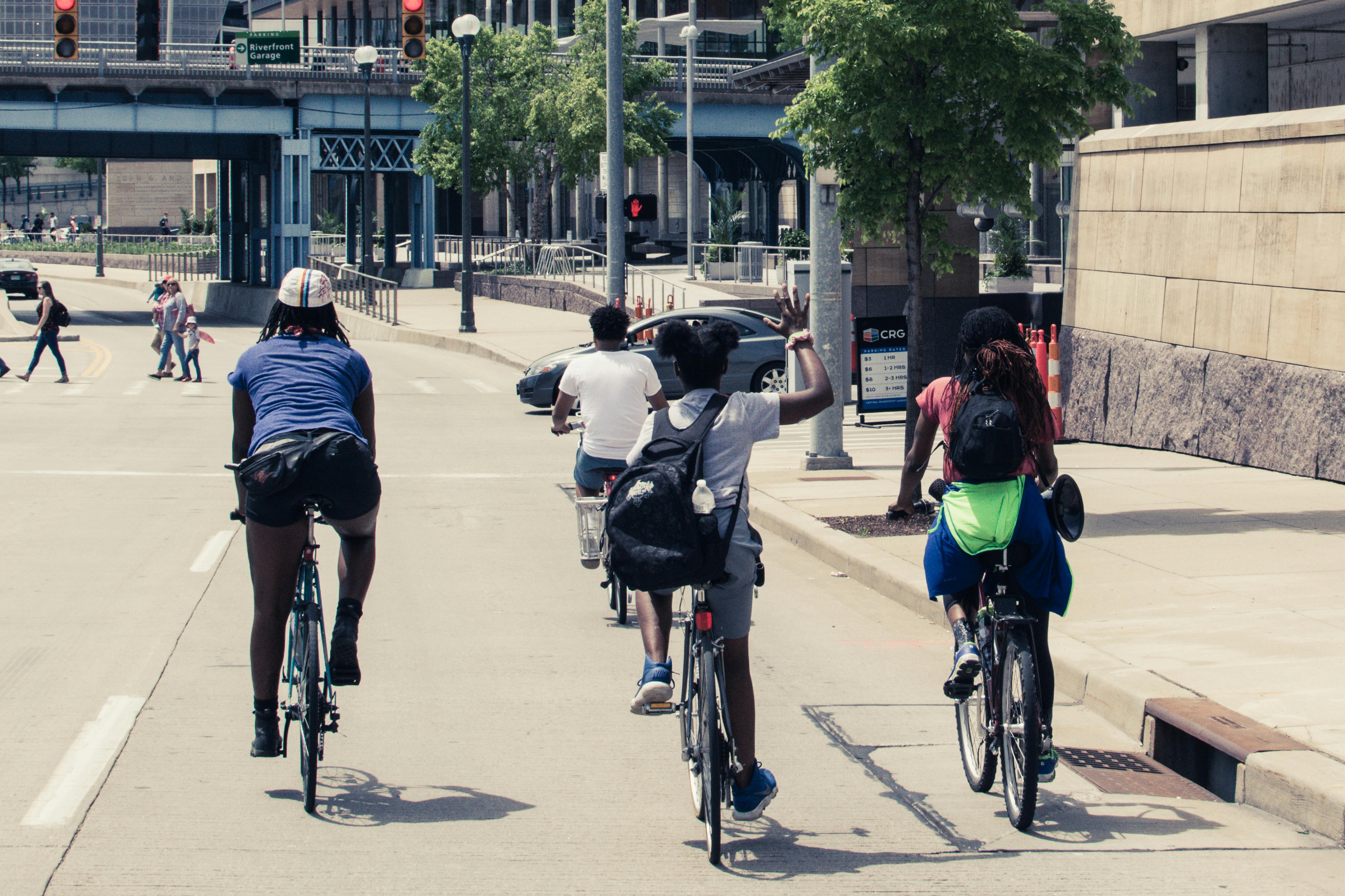 People Riding Bicycles On Road · Free Stock Photo