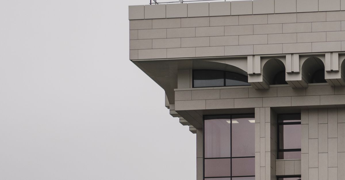 Grey Colorhi Rising Building Gray High-rise Building · Free Stock Photo