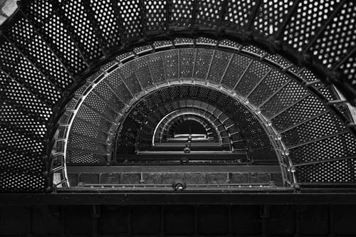 Black and white photograph of a spiral staircase