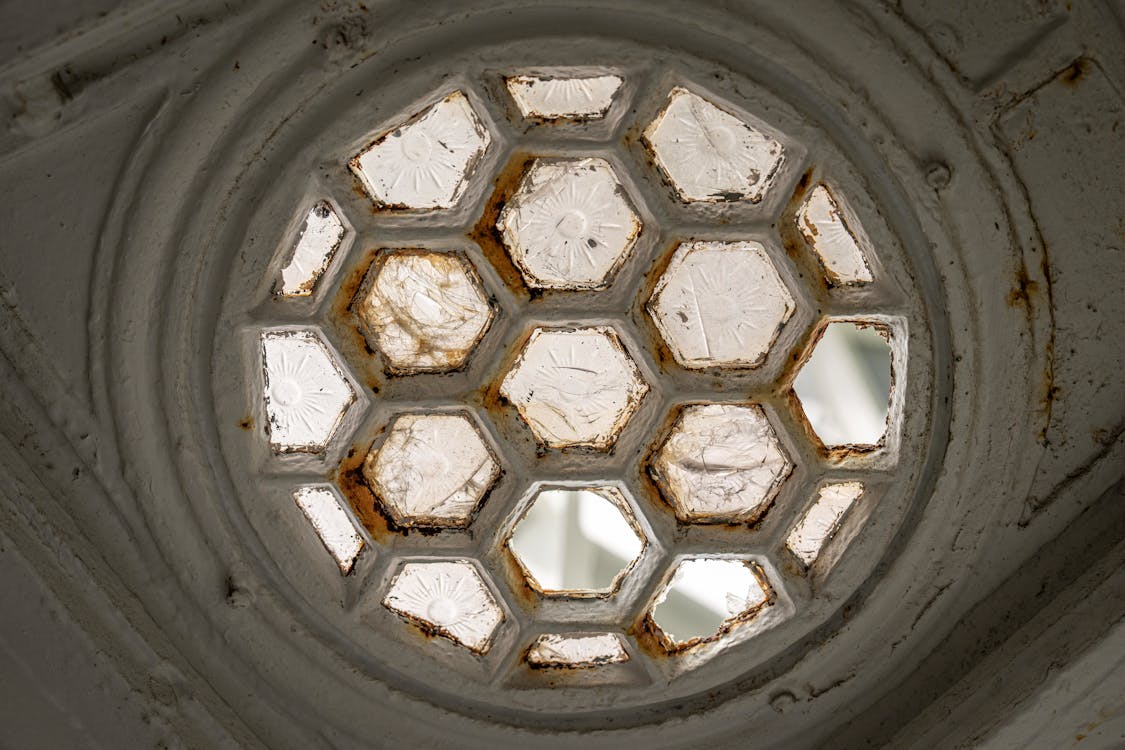 A round window with a hexagonal pattern on it