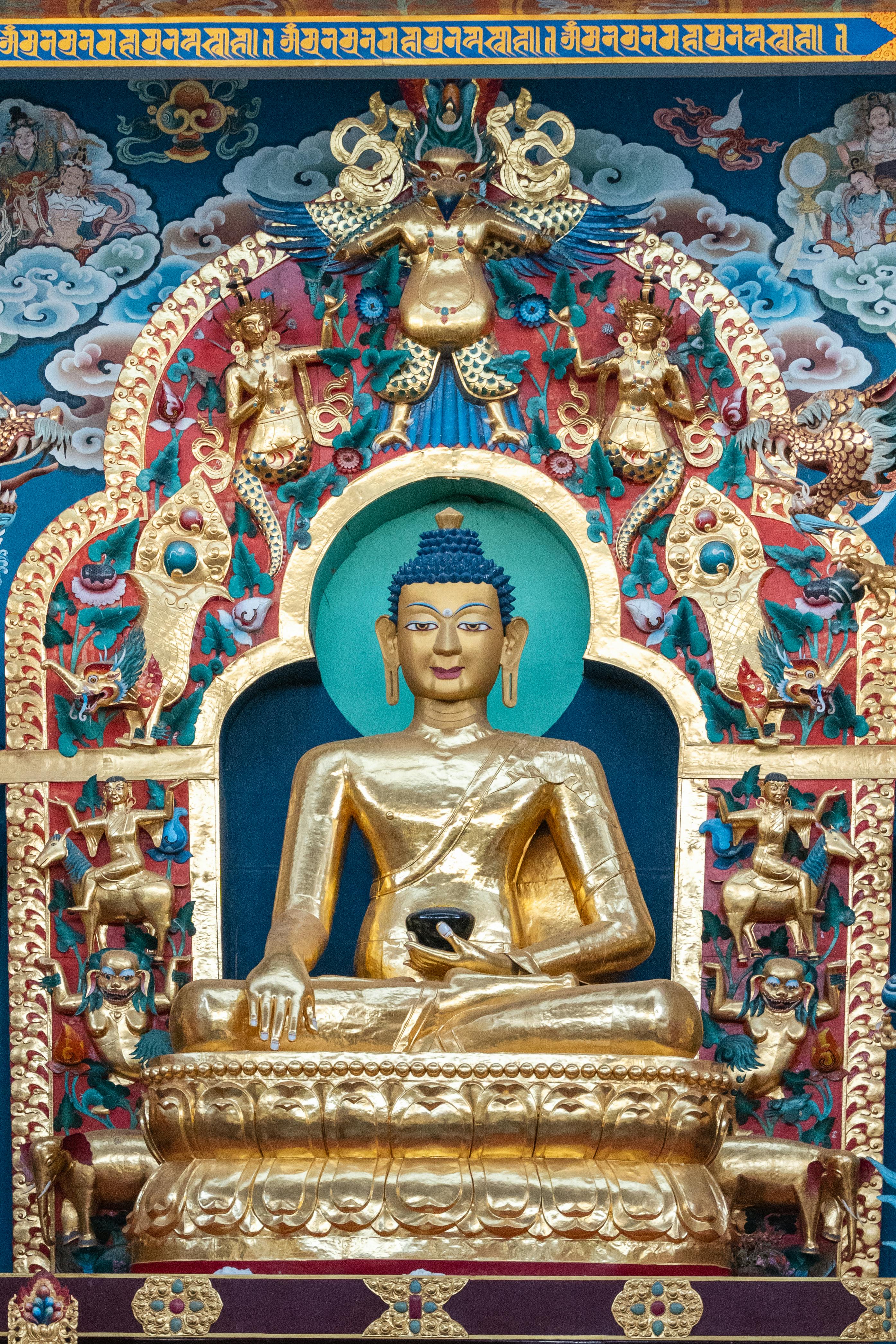 golden buddha monument in temple