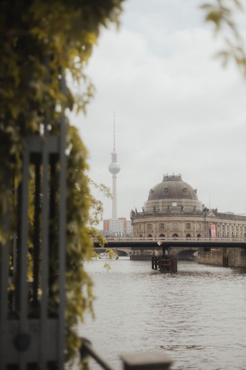 Free Scenic view of Berlin's TV Tower and Bode Museum from a riverside perspective. Stock Photo
