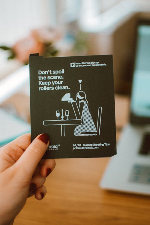 Free Person Holding Don't Spoil the Scene Card Stock Photo