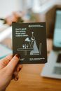 Person Holding Don't Spoil the Scene Card