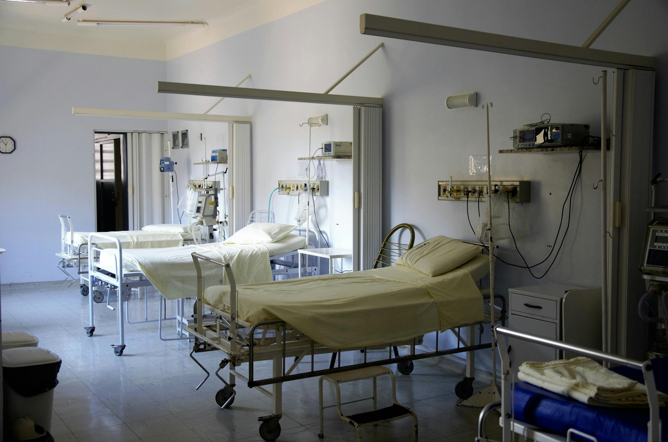 A picture of three hospital beds. Photo by pexels user Pixbay. Used courtesy of Pexels,com