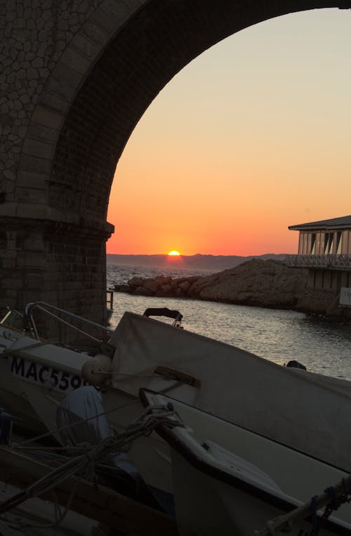 Photos gratuites de bateau, coucher de soleil, mer