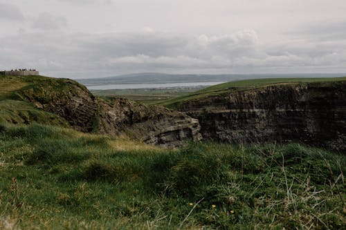 A view of the cliffs of moher from the top of a hill