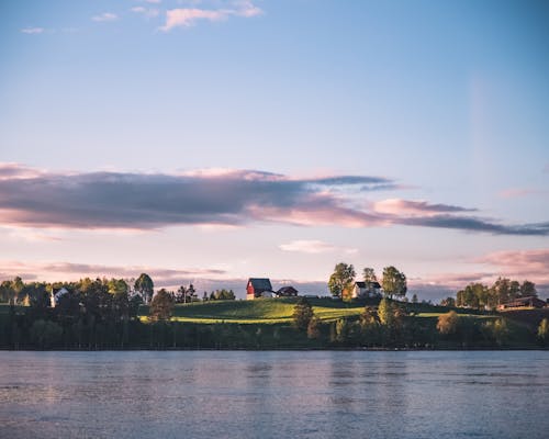 Island Under Blue Sky and White Clouds