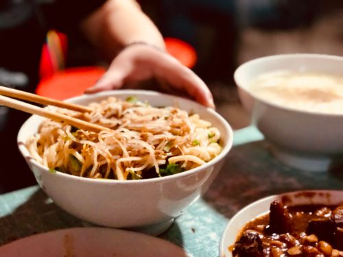 Free Close-up of a delicious Asian noodle bowl with bean sprouts and chopsticks, highlighting authentic cuisine. Stock Photo