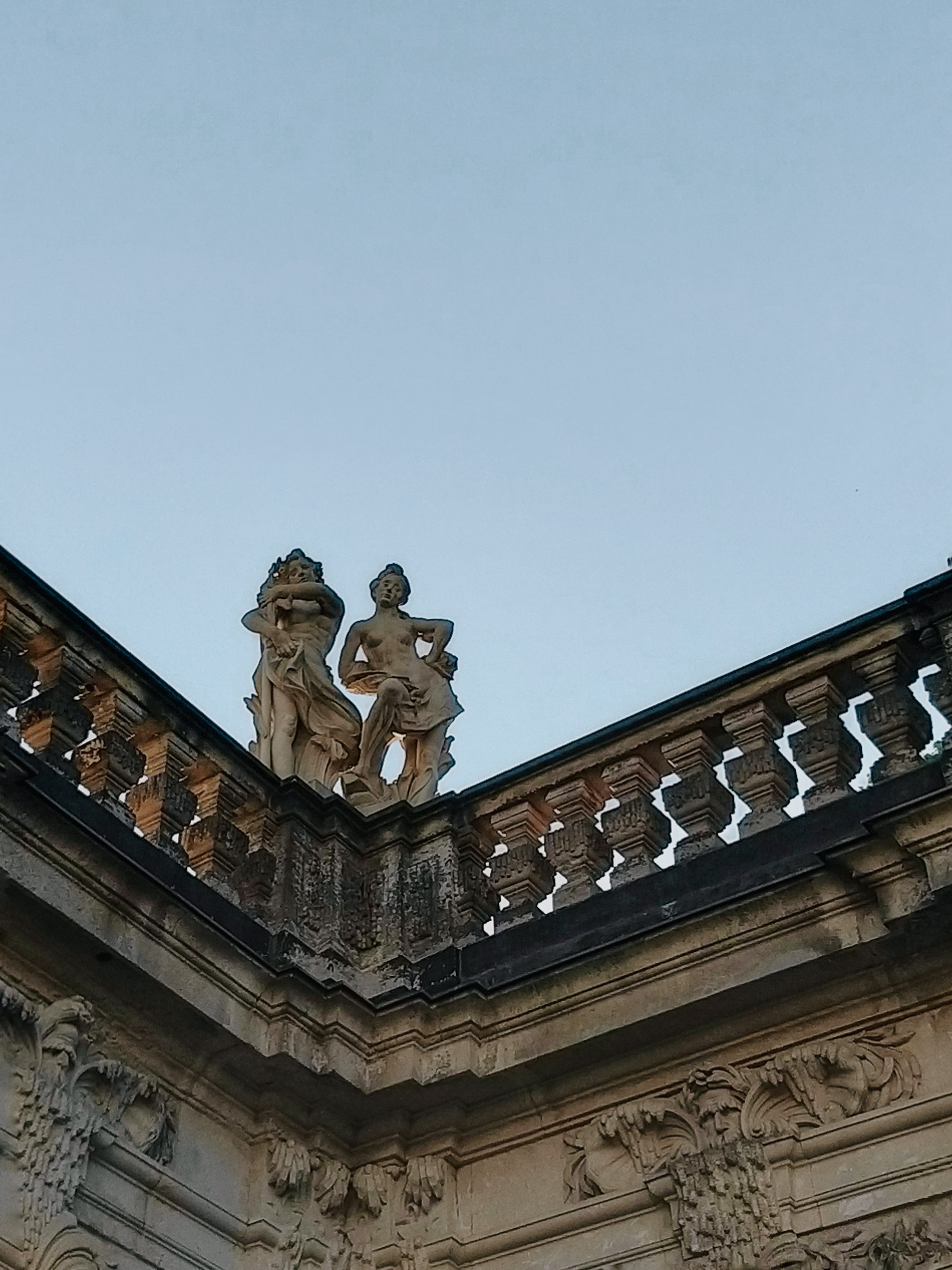 Sculpture on Railing on Rooftop · Free Stock Photo