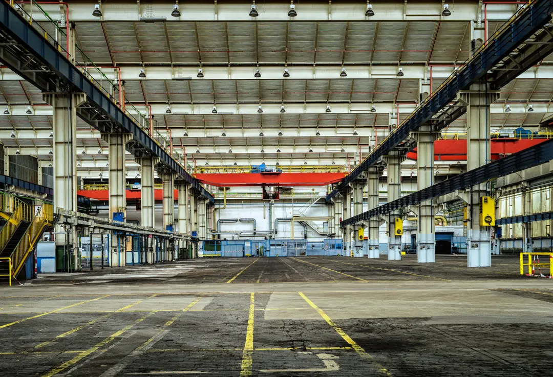 Interior of a completed distribution facility with overhead crane rails