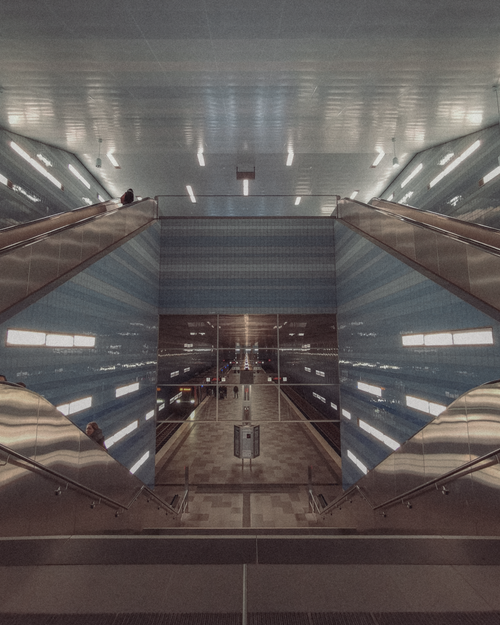 Free Futuristic view of a subway station in Hamburg with sleek design and vibrant lights. Stock Photo
