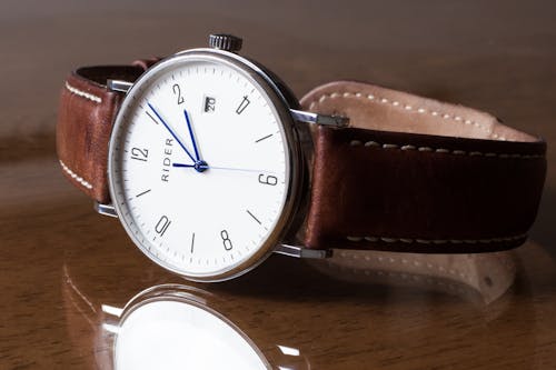 Silver-colored Watch Displaying 2:06