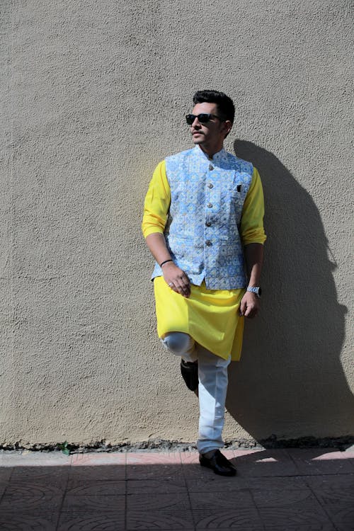 a man wearing kurta and looking side 